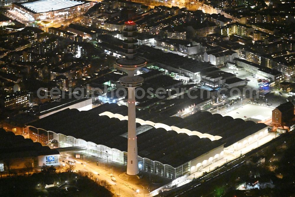 Hamburg at night from above - Night lighting exhibition grounds and exhibition halls of the Neue Messe at the broadcasting tower Heinrich-Hertz-Turm in Hamburg, Germany