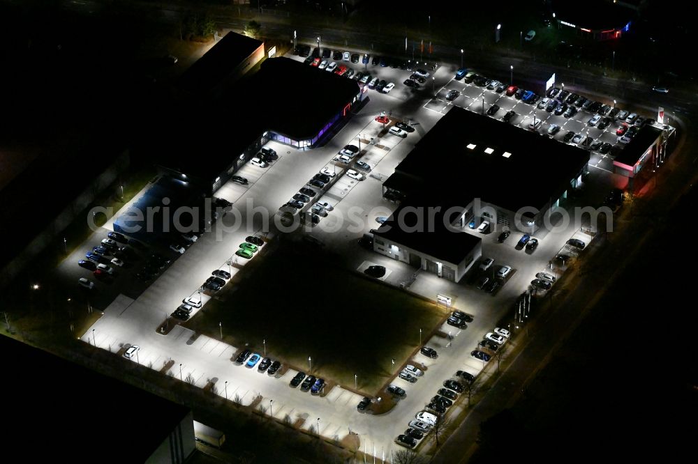 Aerial photograph at night Gotha - Night lighting car dealership building der AHG Gotha - Audi Partner on Cyrusstrasse in Gotha in the state Thuringia, Germany