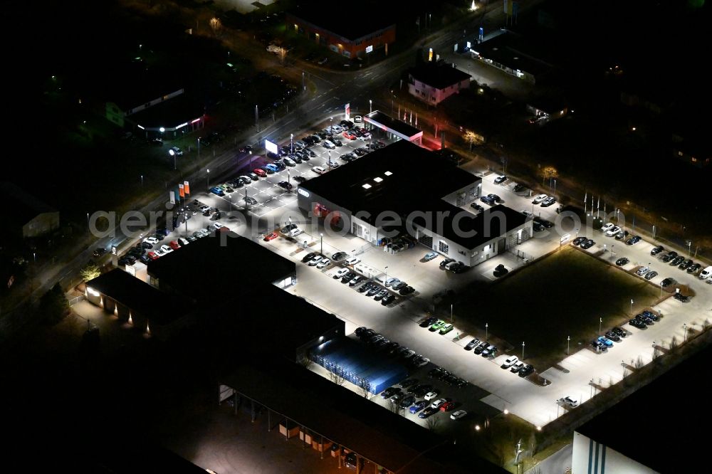 Aerial image at night Gotha - Night lighting car dealership building der AHG Gotha - Audi Partner on Cyrusstrasse in Gotha in the state Thuringia, Germany