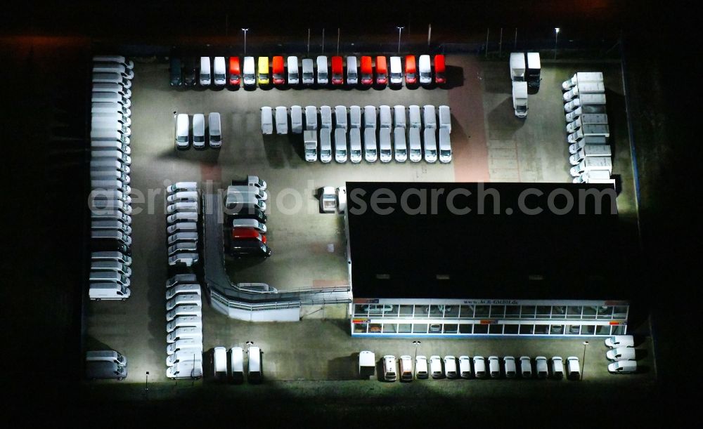 Aerial photograph at night Siek - Night lighting car dealership building ACR GmbH in Siek in the state Schleswig-Holstein, Germany