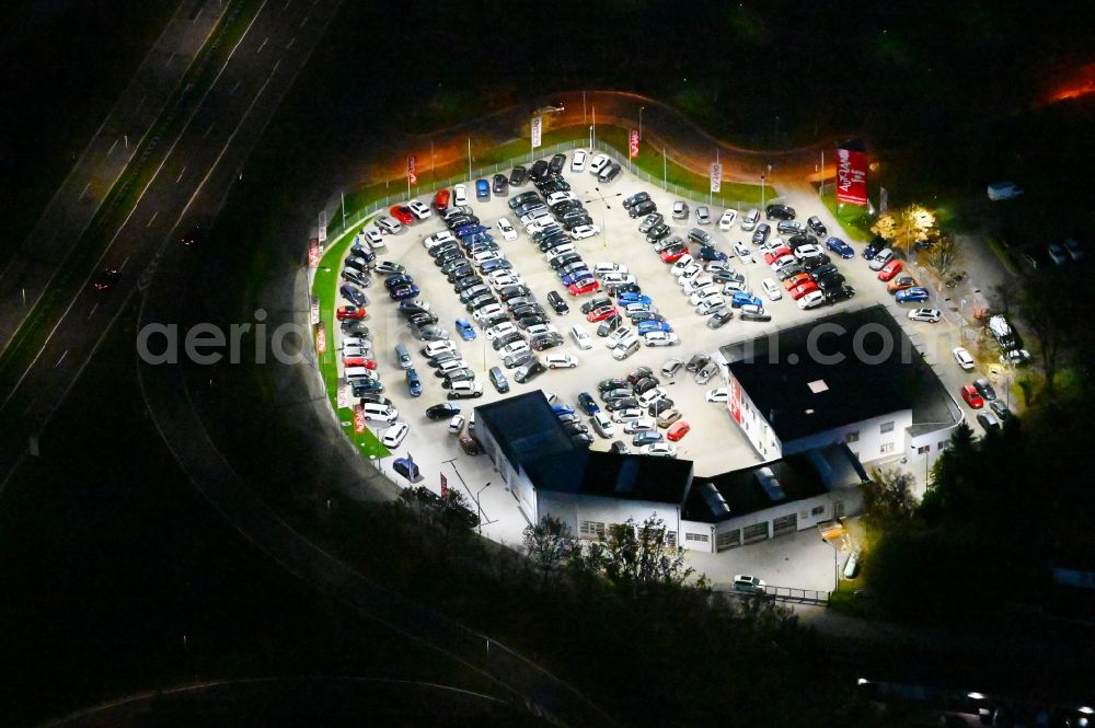 Aerial photograph at night Magdeburg - Night lighting car dealership building of Autoland AG in the district Reform in Magdeburg in the state Saxony-Anhalt, Germany