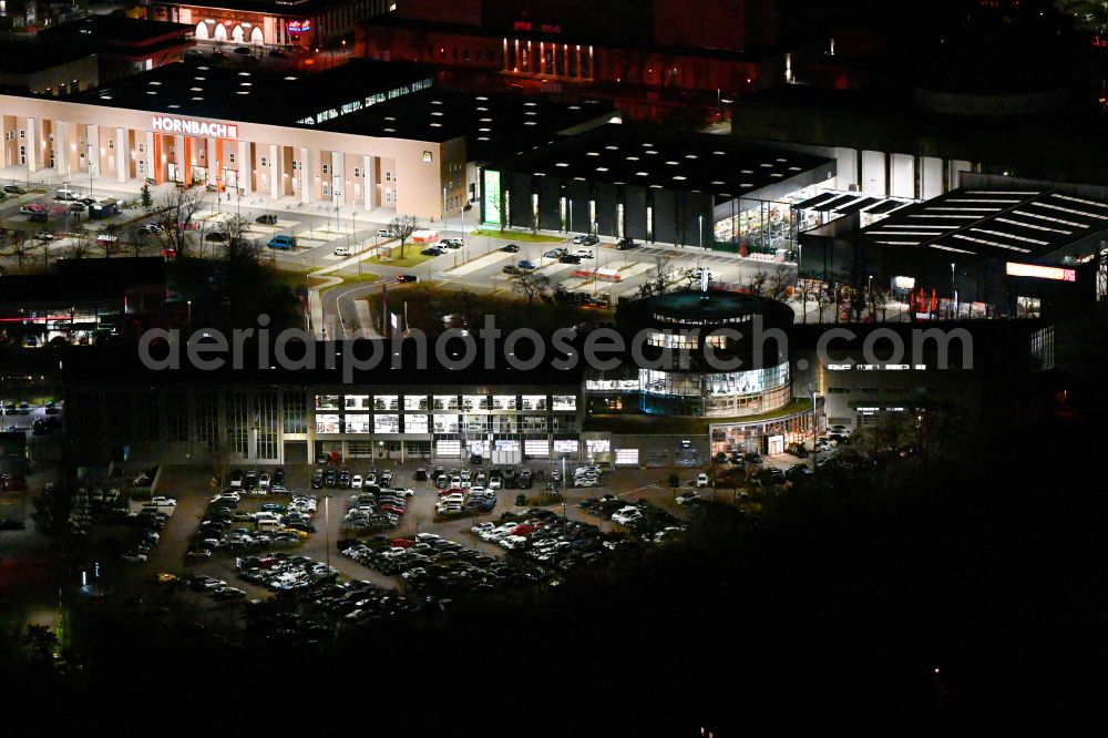 Leipzig at night from above - Night lighting Car dealership building Mercedes-Benz Stern Auto Center Leipzig on Richard-Lehmann-Strasse in the district Marienbrunn in Leipzig in the state Saxony