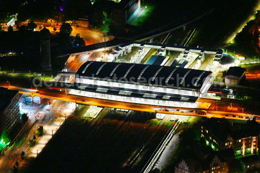 Aerial photograph at night Berlin - Night lighting route expansion station - Warschauer road to east cross rail station Ostkreuz Friedrichshain district of Berlin