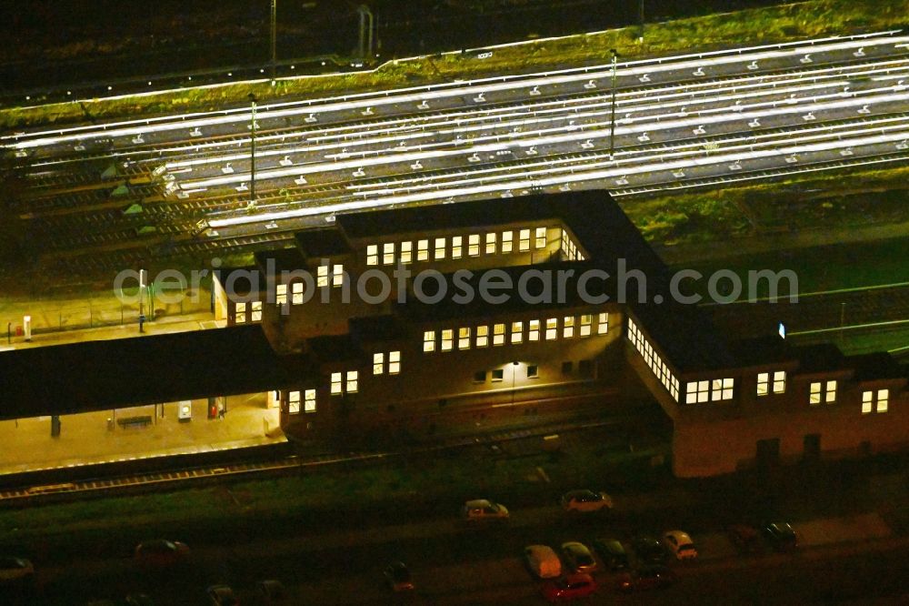 Berlin at night from above - Night lighting station building and track systems of Metro subway station U-Bahnhof Hoenow in the district Hellersdorf in Berlin, Germany