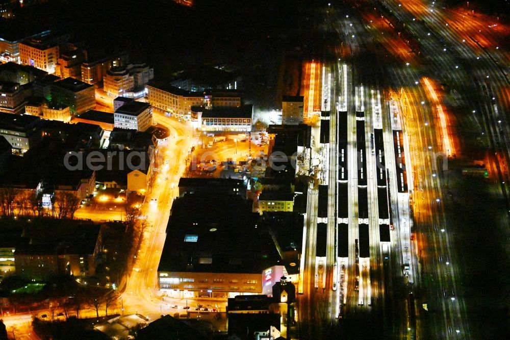 Aerial photograph at night Augsburg - Night lighting construction work for the reconstruction of the station building Central Station of Deutschen Bahn in Augsburg in the state Bavaria, Germany