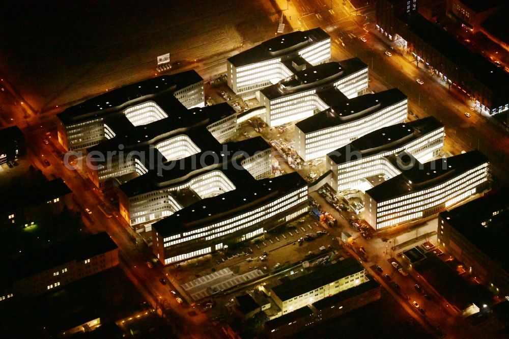 Berlin at night from above - Night lighting construction site to build a new office and commercial building Allianz Campus Berlin in the district Johannisthal - Adlershof in Berlin
