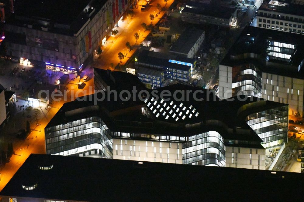 Berlin at night from above - Night lighting Construction site to build a new office and commercial building Zalando Campus on Valeska-Gert-Strasse in the district Friedrichshain in Berlin, Germany