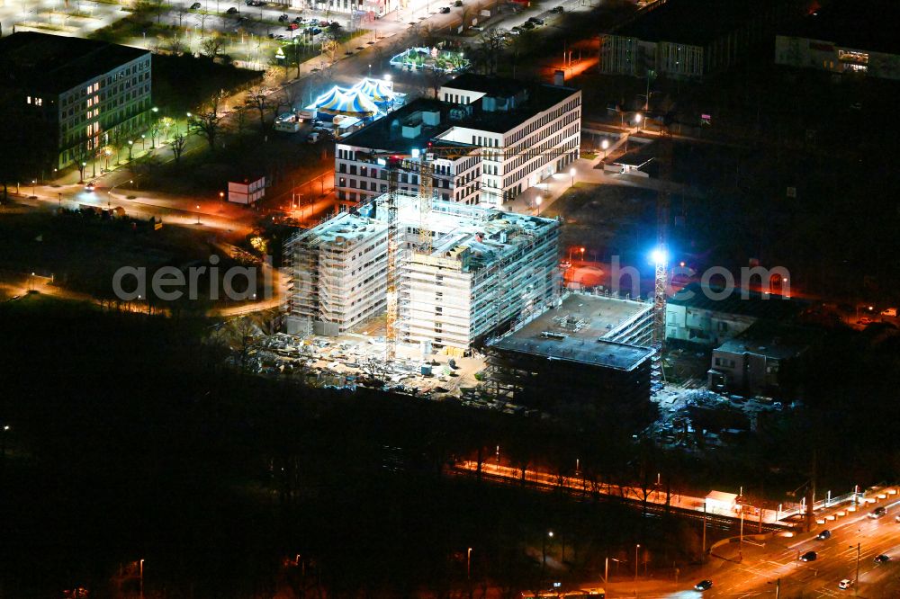 Leipzig at night from the bird perspective: Night lighting construction site for the new building of a research building and office complex BioSquare Leipzig on street Alte Messe in Leipzig in the state Saxony, Germany