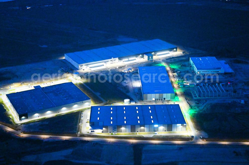 Vehlefanz at night from above - Night lighting construction site to build a new building complex on the site of the logistics center Im Gewerbepark in the district Vehlefanz in Oberkraemer in the state Brandenburg, Germany