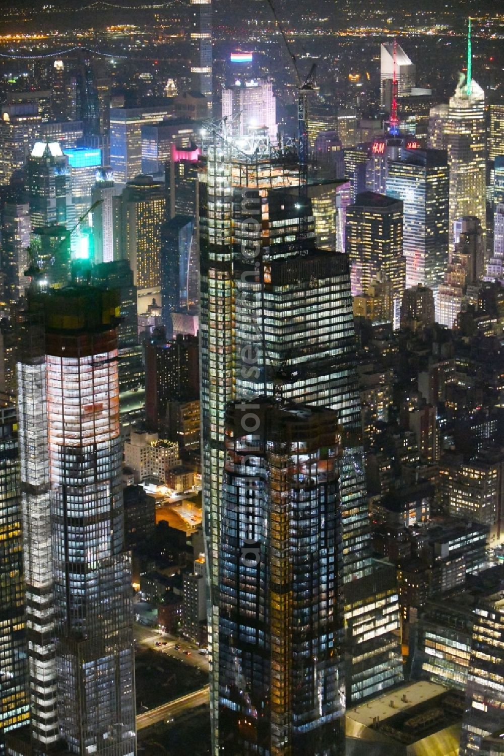 Aerial image at night New York - Night lighting Construction site for new high-rise building complex on 10th Avenue in New York in United States of America