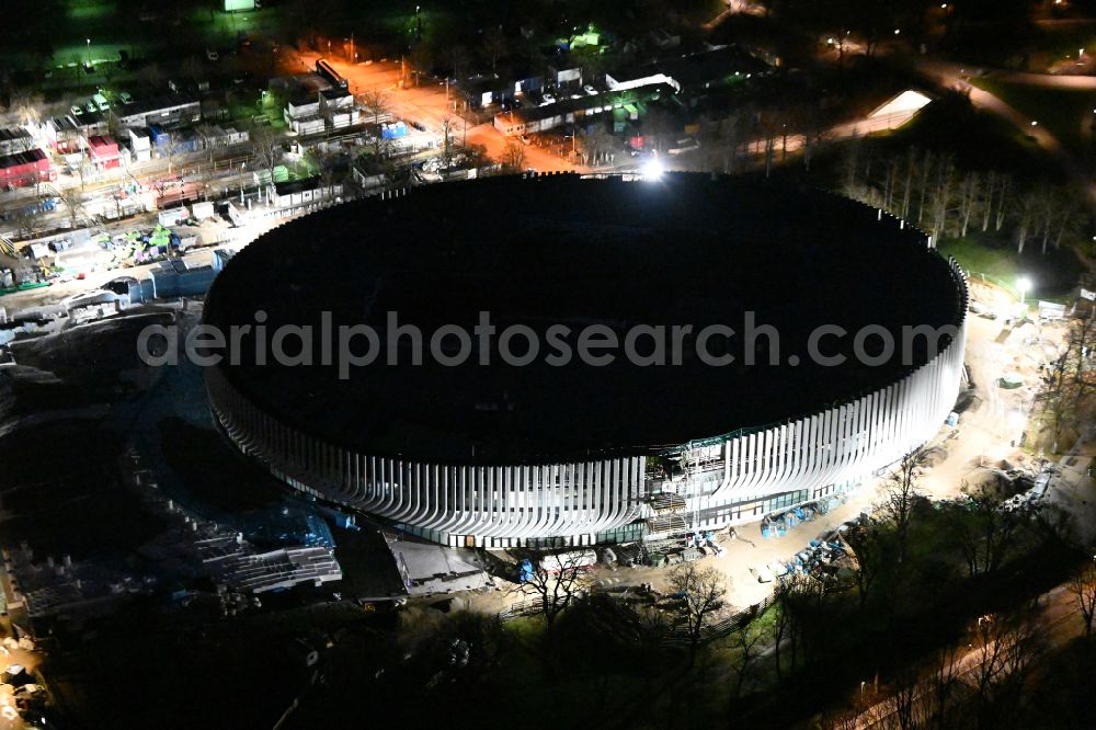 Aerial image at night München - Night lighting construction site for the new sports hall SAP Garden in Olympiapark on street Toni-Merkens-Weg in the district Milbertshofen-Am Hart in Munich in the state Bavaria, Germany