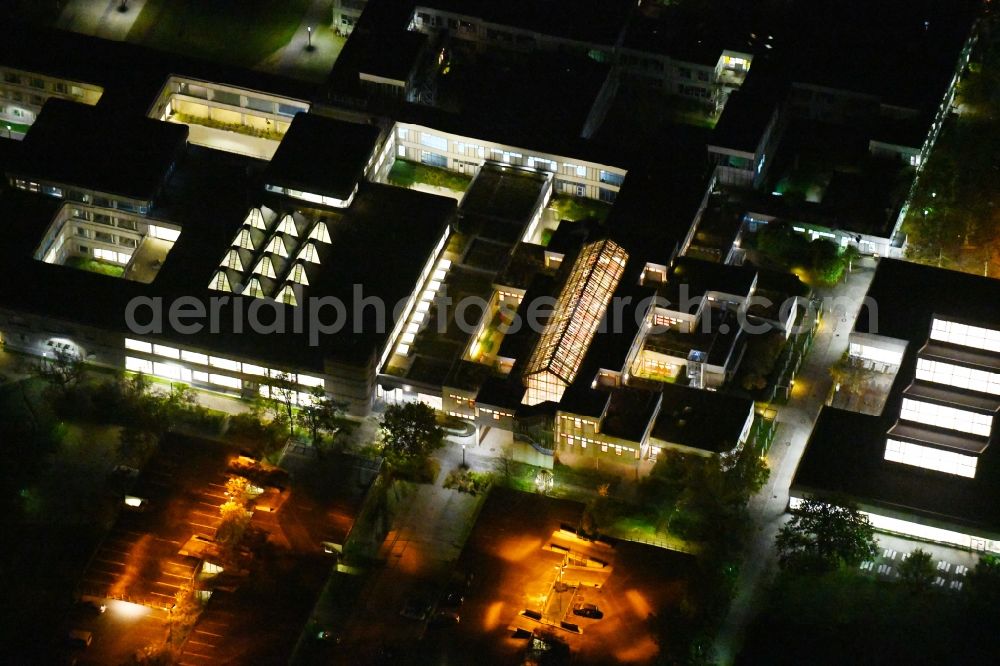 Berlin at night from the bird perspective: Night lighting library Building of Campusbibliothek on Fabeckstrasse in the district Dahlem in Berlin, Germany