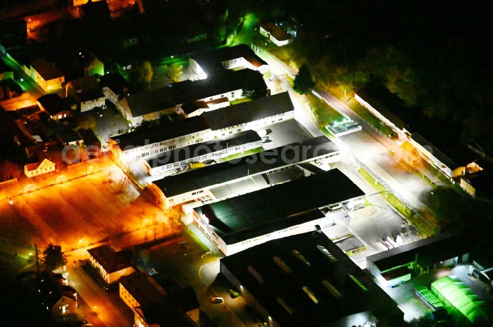 Ballenstedt at night from above - Night lighting building and production halls on the premises of the brewery of Linde Hydraulics GmbH & Co. KG in Ballenstedt in the state Saxony-Anhalt, Germany
