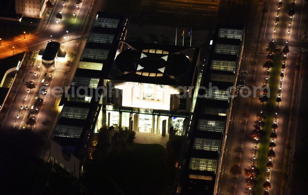 Aerial photograph at night Berlin - Night view of chancellor's Office in the government district on the banks of the River Spree in Berlin Tiergarten