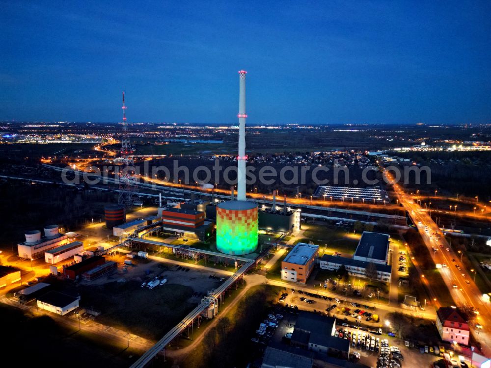 Aerial photograph at night Halle (Saale) - Night lighting power station plants of the combined heat and power station - regional heat on Dieselstrasse in Halle (Saale) in the state Saxony-Anhalt, Germany