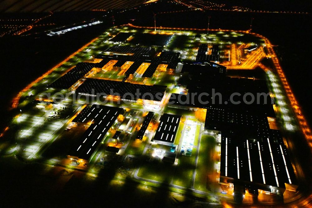Leipzig at night from the bird perspective: Night lighting site location of Bayerische Motoren Werke AG BMW Leipzig in Saxony