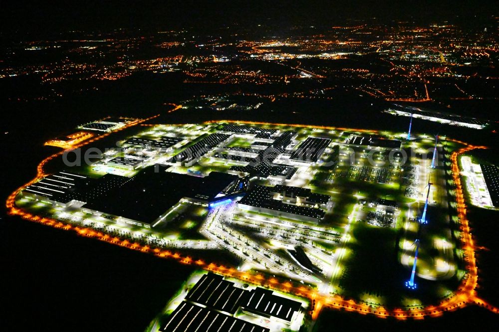 Aerial image at night Leipzig - Night lighting site location of Bayerische Motoren Werke AG BMW Leipzig in Saxony