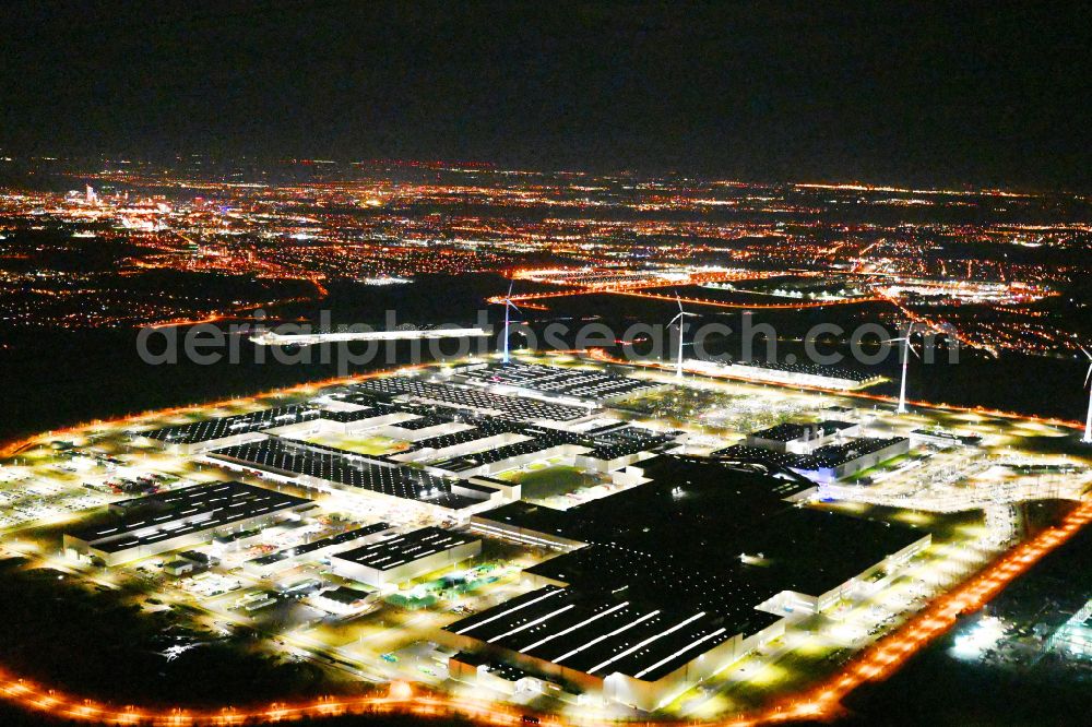 Leipzig at night from the bird perspective: Night lighting site location of Bayerische Motoren Werke AG BMW Leipzig in Saxony
