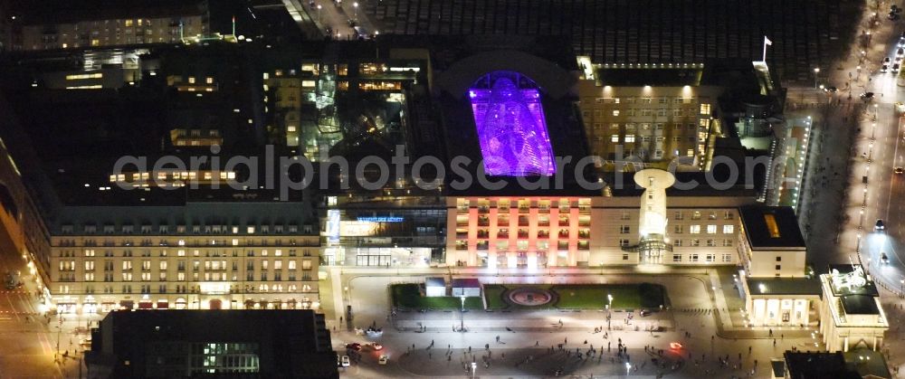 Berlin at night from the bird perspective: Night view of British and American Embassy, Academy of Arts, Hotel Adlon on Pariser Platz in Berlin-Mitte