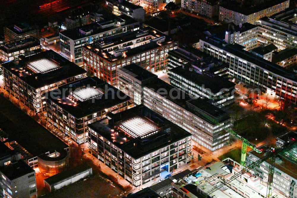 München at night from above - Night lighting office building - Ensemble of iCampus Rhenania on Friedenstrasse corner Muehldorfstrasse in the district Berg am Laim in Munich in the state Bavaria, Germany