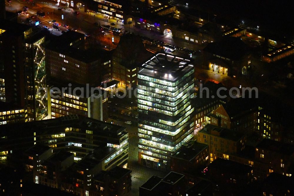 Aerial image at night Hamburg - Night lighting office and corporate management high-rise building ASTRATURM on Zirkusweg in Hamburg, Germany