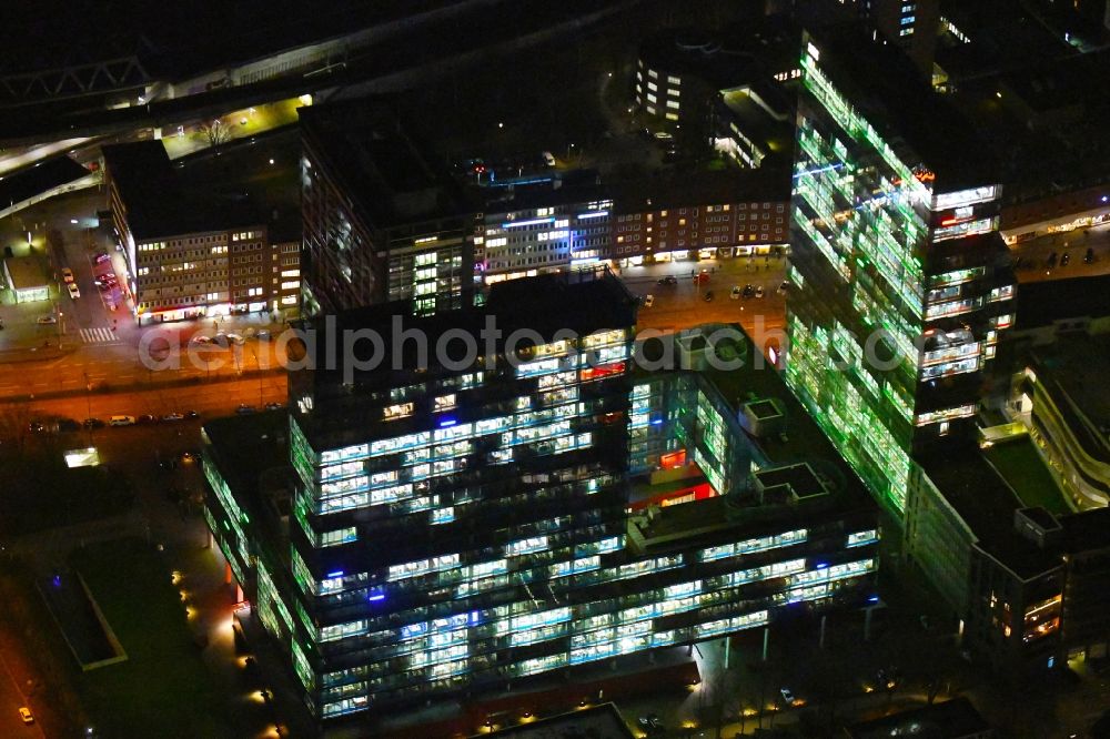 Aerial photograph at night Hamburg - Night lighting office and corporate management high-rise building Beim Strohhause in the district Sankt Georg in Hamburg, Germany