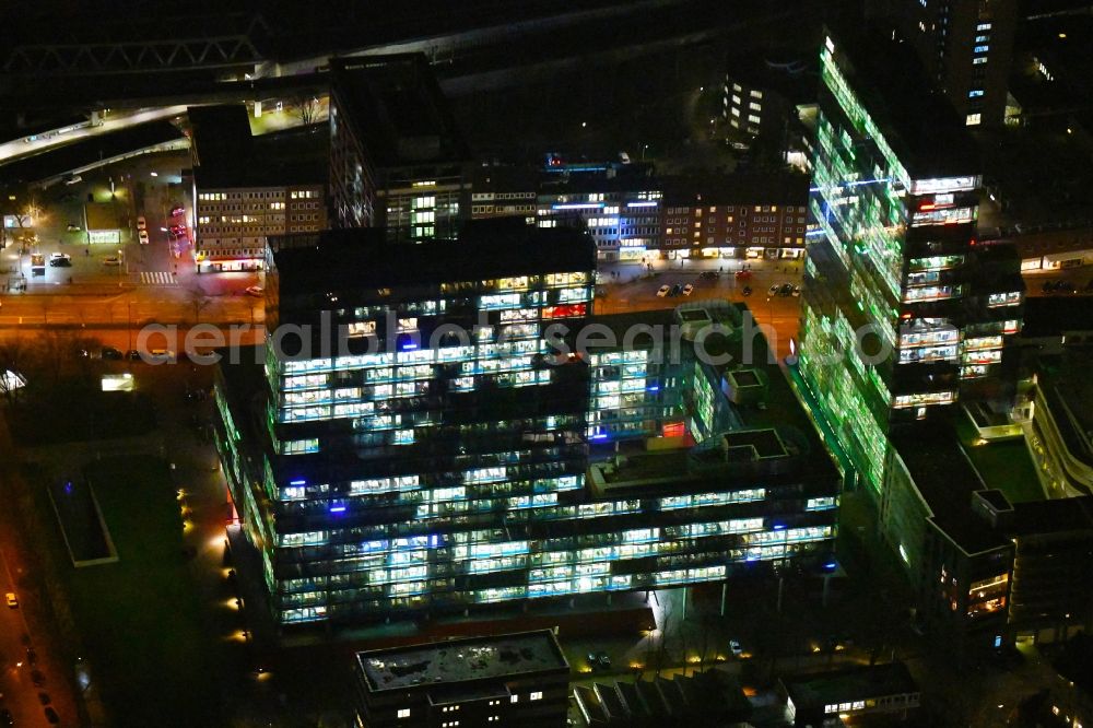 Aerial image at night Hamburg - Night lighting office and corporate management high-rise building Beim Strohhause in the district Sankt Georg in Hamburg, Germany