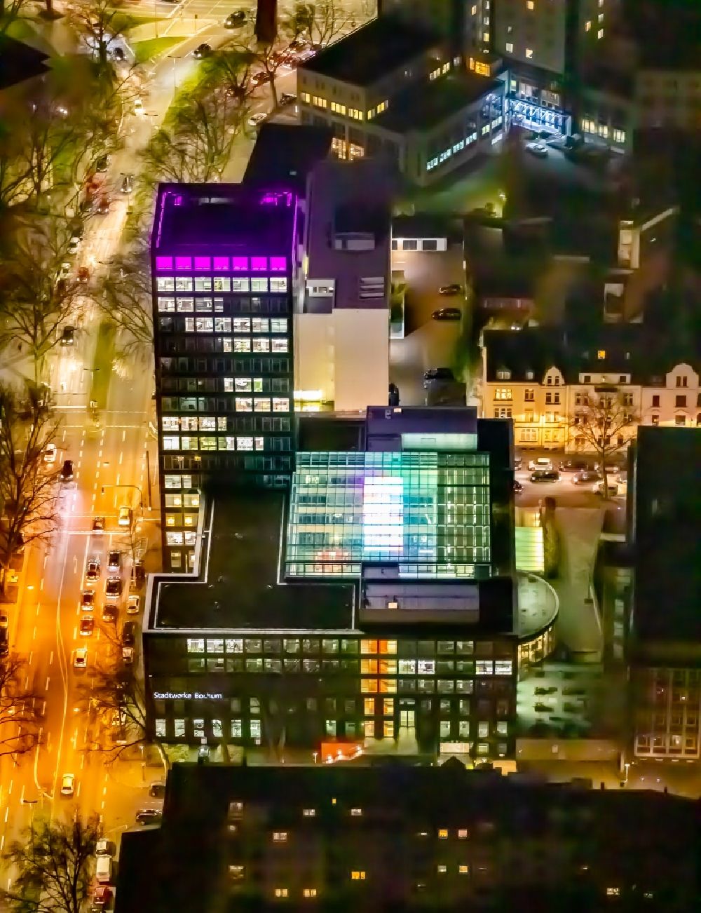 Aerial image at night Bochum - Night lighting office and corporate management high-rise building Stadtwerke Bochum GmbH on Ostring in the district Innenstadt in Bochum in the state North Rhine-Westphalia, Germany