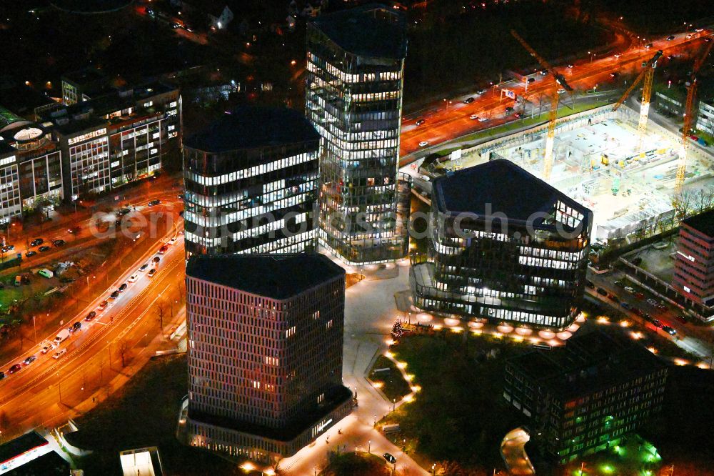 München at night from the bird perspective: Night lighting office building of the administration and business house ensemble Bavaria Towers on Truderinger Strasse in the district on street Riedenburger Strasse of Bogenhausen in Munich in the state Bavaria, Germany
