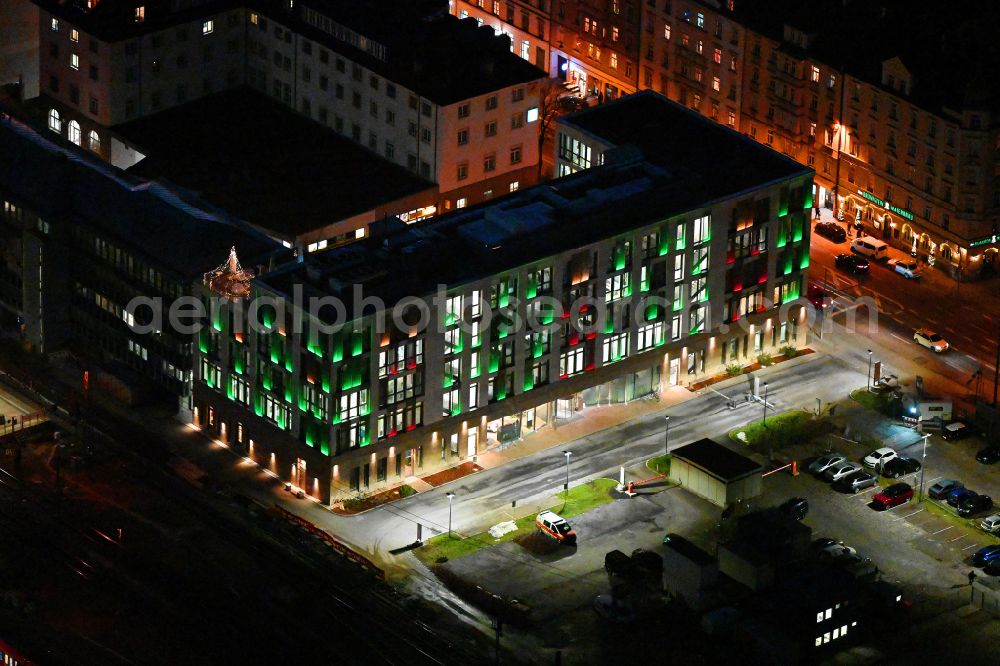 München at night from above - Night lighting office building of GVG Immobilien Service GmbH on street Orleansstrasse - Orleansplatz in the district Au-Haidhausen in Munich in the state Bavaria, Germany