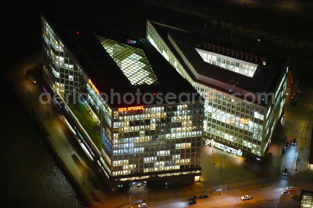 Aerial image at night Hamburg - Night lighting office building of the administrative house and business house the SPIEGEL publishing company Rudolf Augstein GmbH and Co. KG and the manager magazine Publishing company society mbh in Hamburg, Germany