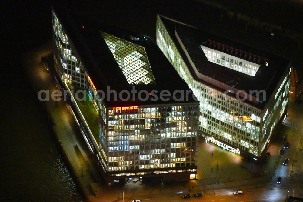 Aerial photograph at night Hamburg - Night lighting office building of the administrative house and business house the SPIEGEL publishing company Rudolf Augstein GmbH and Co. KG and the manager magazine Publishing company society mbh in Hamburg, Germany