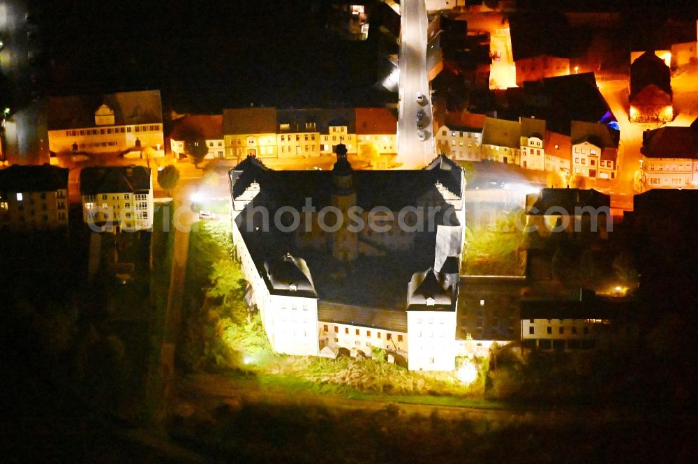 Coswig (Anhalt) at night from the bird perspective: Night lighting castle of in Coswig (Anhalt) in the state Saxony-Anhalt, Germany