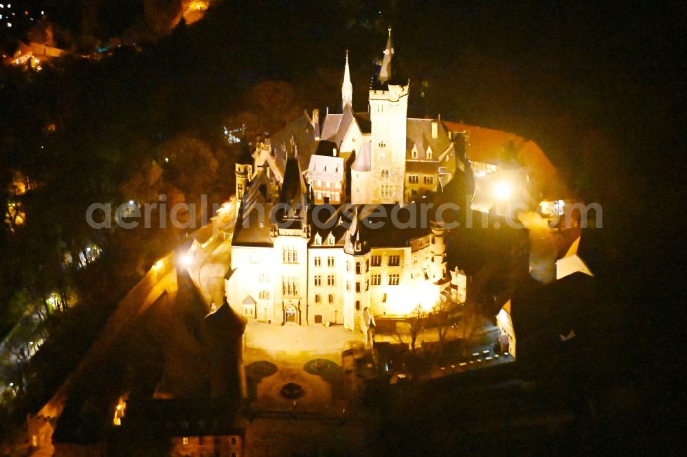 Wernigerode at night from the bird perspective: Night lighting castle of the fortress Schloss Wernigerode in Wernigerode in the state Saxony-Anhalt, Germany