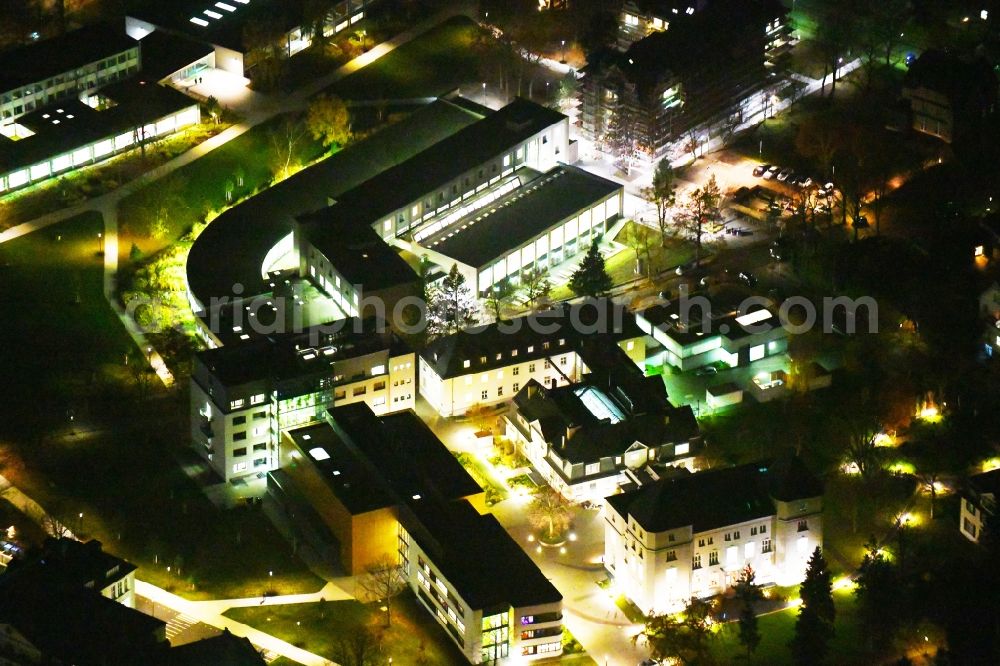 Aerial photograph at night Berlin - Night lighting Campus building of the university Freie Universitaet Berlin in the district Dahlem in Berlin, Germany
