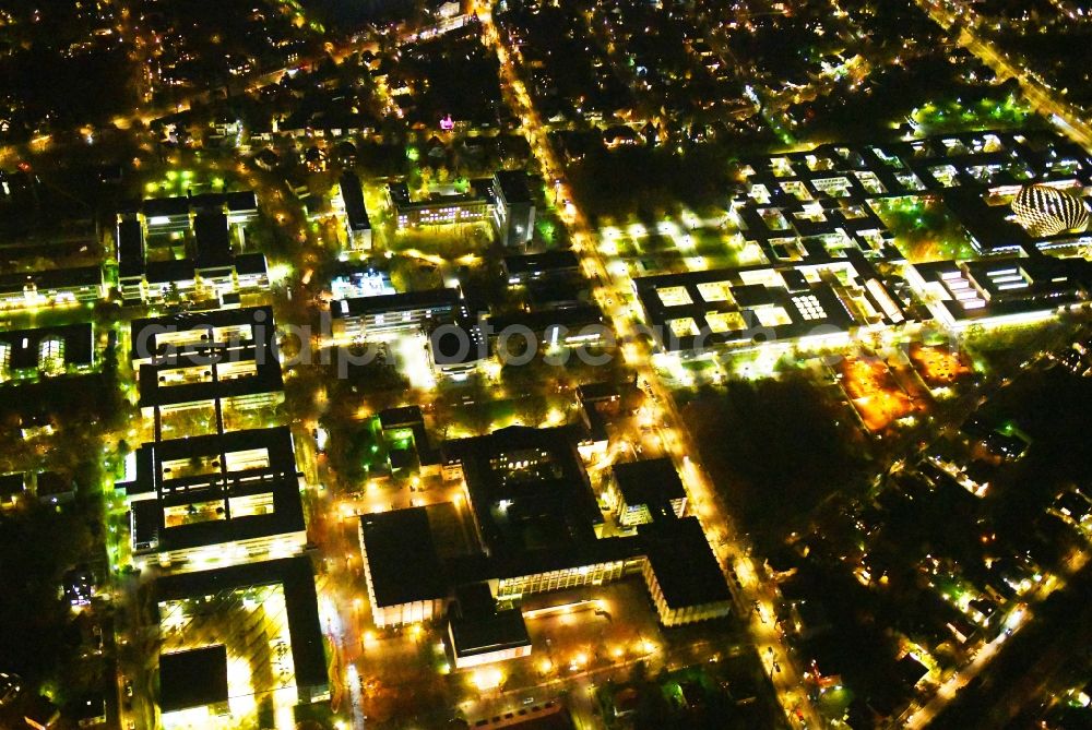 Aerial photograph at night Berlin - Night lighting Campus building of the university Freie Universitaet Berlin on Kaiserswerther Strasse in the district Dahlem in Berlin, Germany