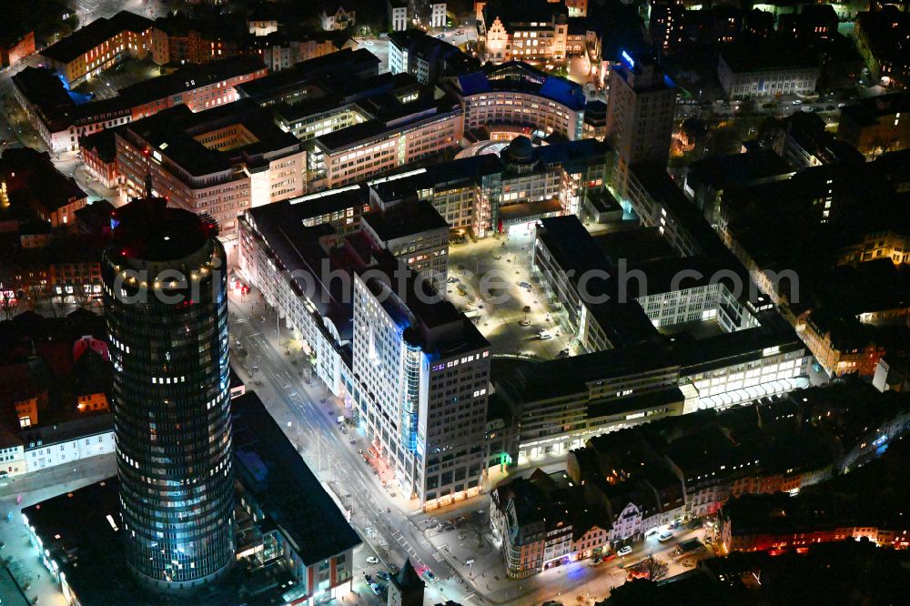 Jena at night from the bird perspective: Night lighting campus building of the university Friedrich-Schiller-Universitaet Jena and office building of the Jenoptik AG on Carl-Zeiss-Strasse in Jena in the state Thuringia, Germany