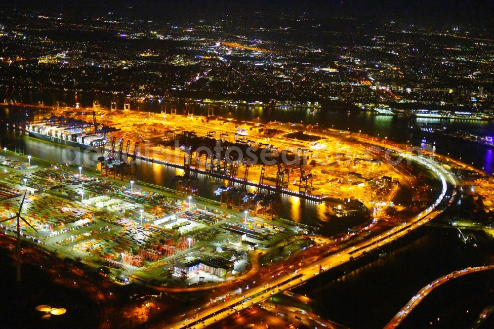 Hamburg at night from the bird perspective: Night lighting container Terminal in the port of the international port of the EUROGATE Container Terminal Hamburg GmbH im Morgennebel in Hamburg