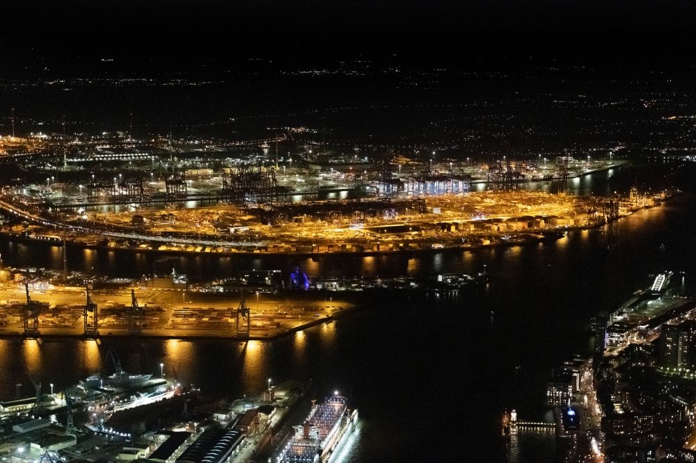 Aerial photograph at night Hamburg - Night lighting container Terminal Tollerort in the port of the international port in district Steinwerder in Hamburg with sewage works Koehlbrandhoeft