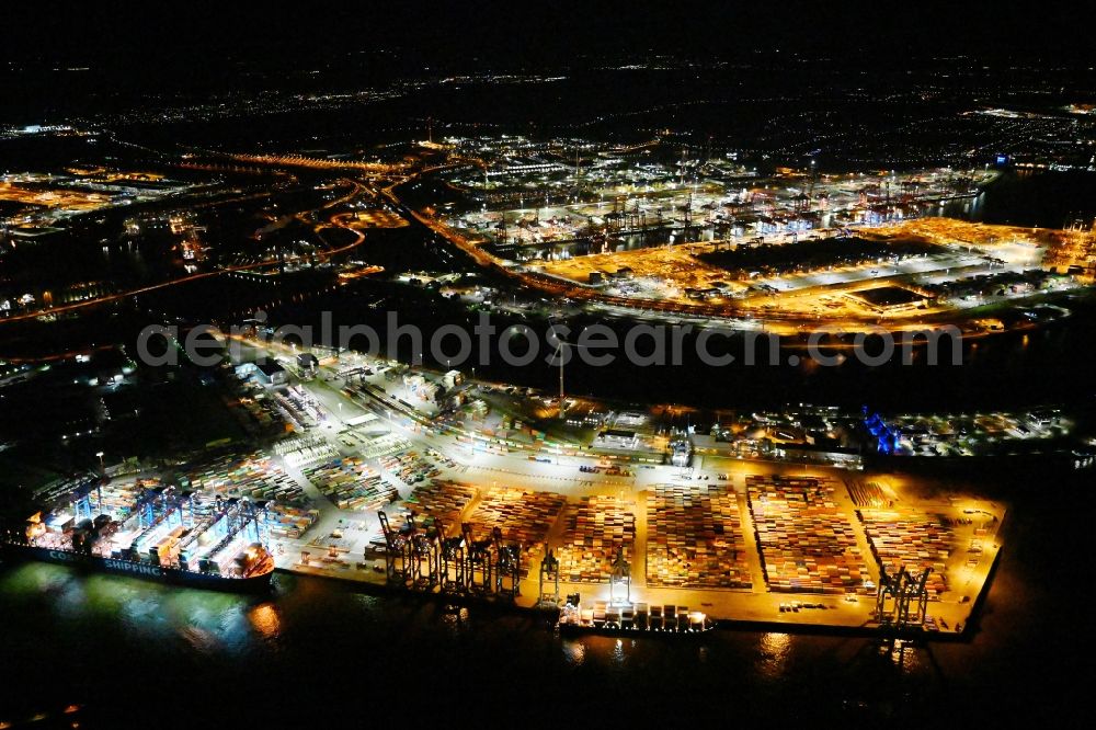 Aerial photograph at night Hamburg - Night lighting container Terminal Tollerort in the port of the international port in district Steinwerder in the district Steinwerder in Hamburg with sewage works Koehlbrandhoeft