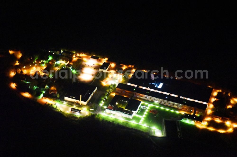 Aerial image at night Riems - Night lighting Extension of new building site at the building complex of the institute Friedrich-Loeffler-Institutes FLI in Riems in the state Mecklenburg - Western Pomerania, Germany