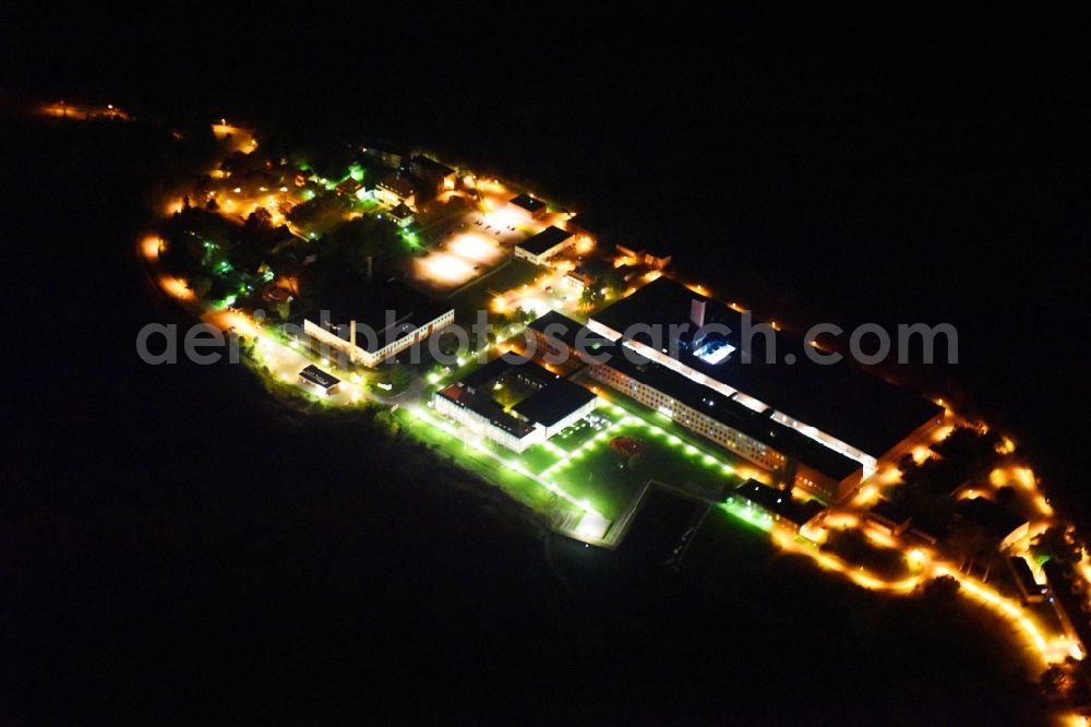 Riems at night from above - Night lighting Extension of new building site at the building complex of the institute Friedrich-Loeffler-Institutes FLI in Riems in the state Mecklenburg - Western Pomerania, Germany