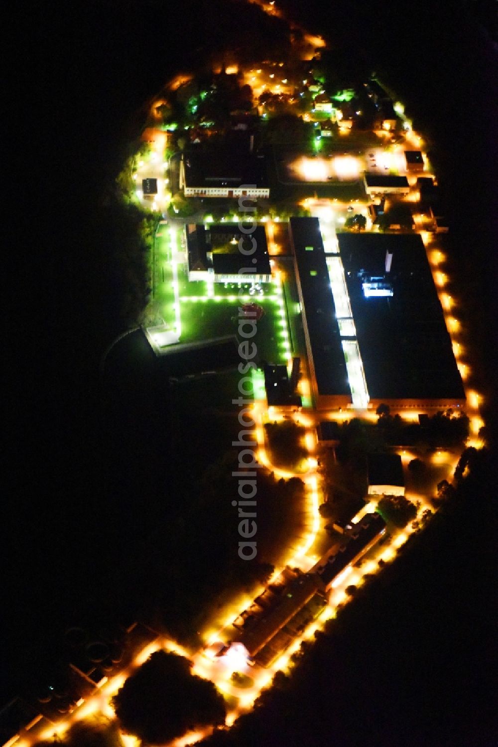 Riems at night from the bird perspective: Night lighting Extension of new building site at the building complex of the institute Friedrich-Loeffler-Institutes FLI in Riems in the state Mecklenburg - Western Pomerania, Germany