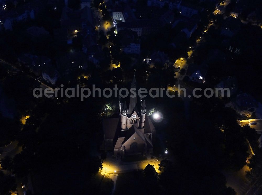 Aerial image at night Halle (Saale) - Night aerial view of the Church St. Paul's Church in St. Paul district of Halle (Saale) in Saxony-Anhalt