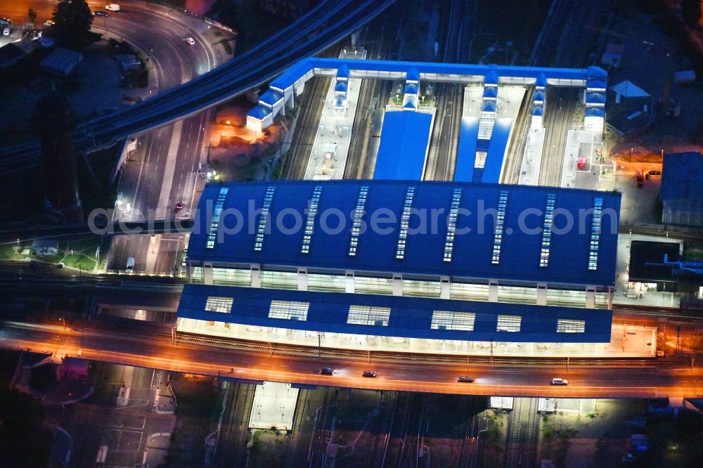 Aerial photograph at night Berlin - Night lighting Route expansion station - Warschauer road to east cross rail station Ostkreuz Friedrichshain district of Berlin