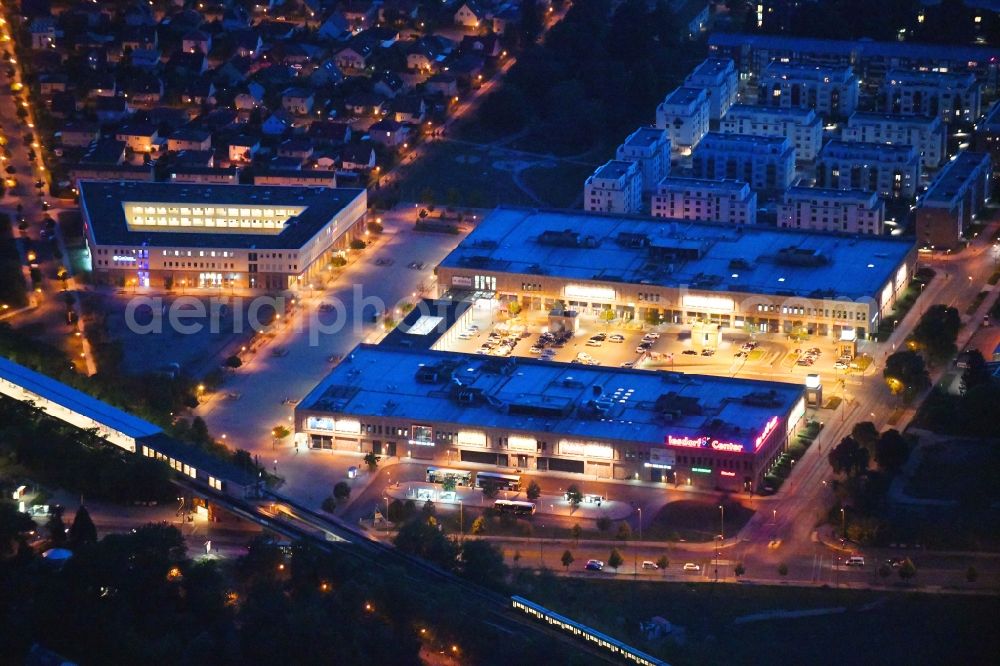 Berlin at night from above - Night lighting of the shopping Mall Biesdorf Center on Weissenhoher Strasse in Berlin Biesdorf