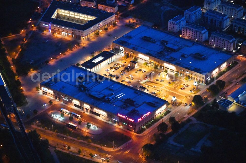 Aerial photograph at night Berlin - Night lighting of the shopping Mall Biesdorf Center on Weissenhoher Strasse in Berlin Biesdorf