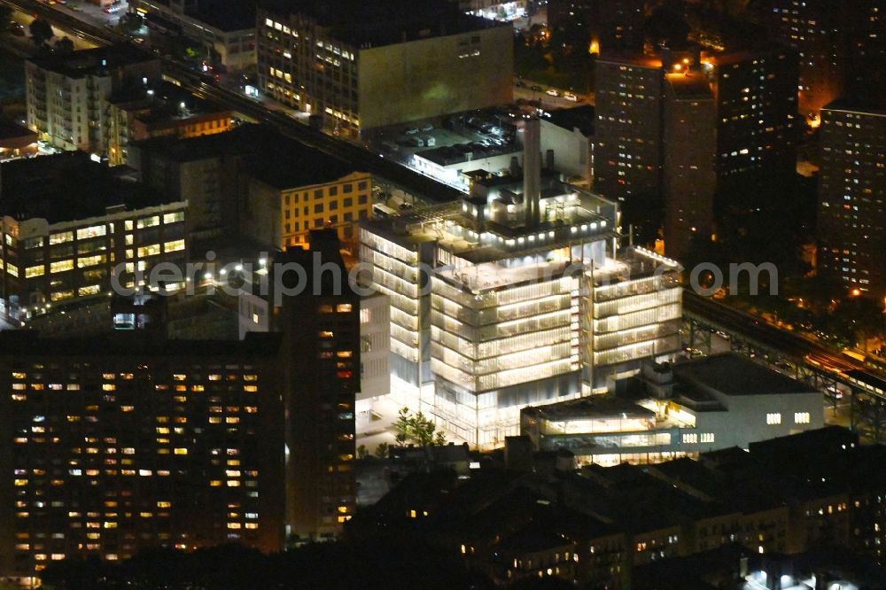 Aerial photograph at night New York - Night lighting Research building and office complex Jerome L. Greene Science Center on Broadway in New York in United States of America