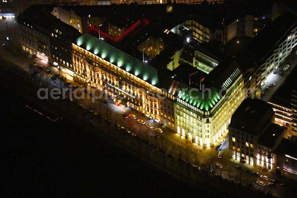 Aerial photograph at night Hamburg - Night lighting complex of the hotel building Fairmont Hotel Vier Jahreszeiten on Neuer Jungfernstieg in Hamburg, Germany