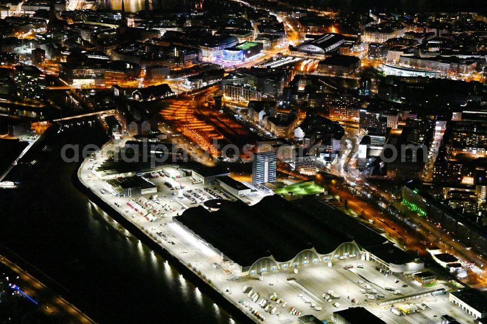 Aerial image at night Hamburg - Night lighting building of the wholesale center for flowers, fruits and vegetables in Hamburg, Germany